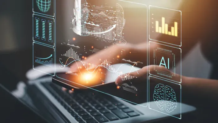 Manos usando ordenador con gráficos de inteligencia artificial y análisis de datos en un entorno digital.