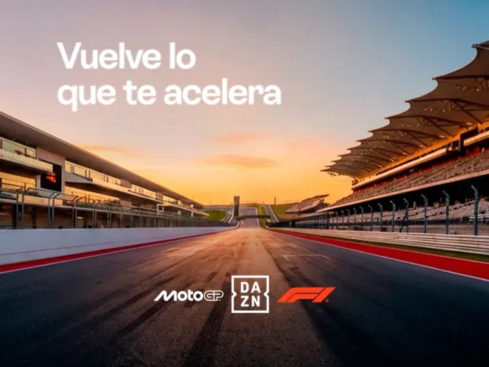 Circuito al atardecer con logos de DAZN MotoGP y F1 para anunciar el regreso del motor en streaming.