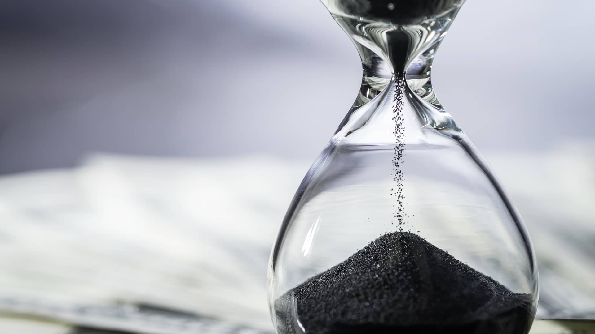 Reloj de arena simboliza préstamo rápido a largo plazo