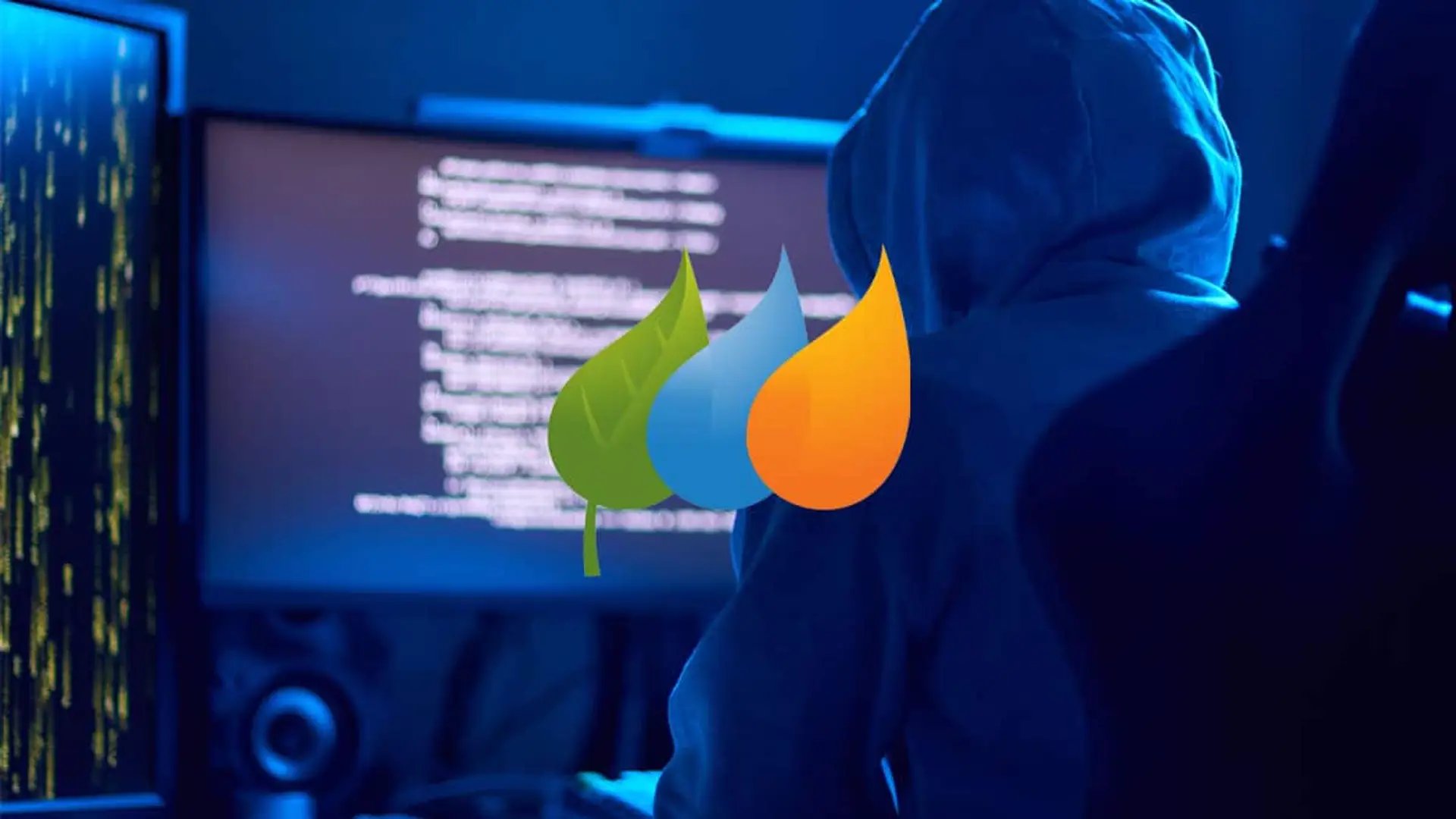 Persona encapuchada frente a varias pantallas con código y el logotipo de Iberdrola sobre la imagen