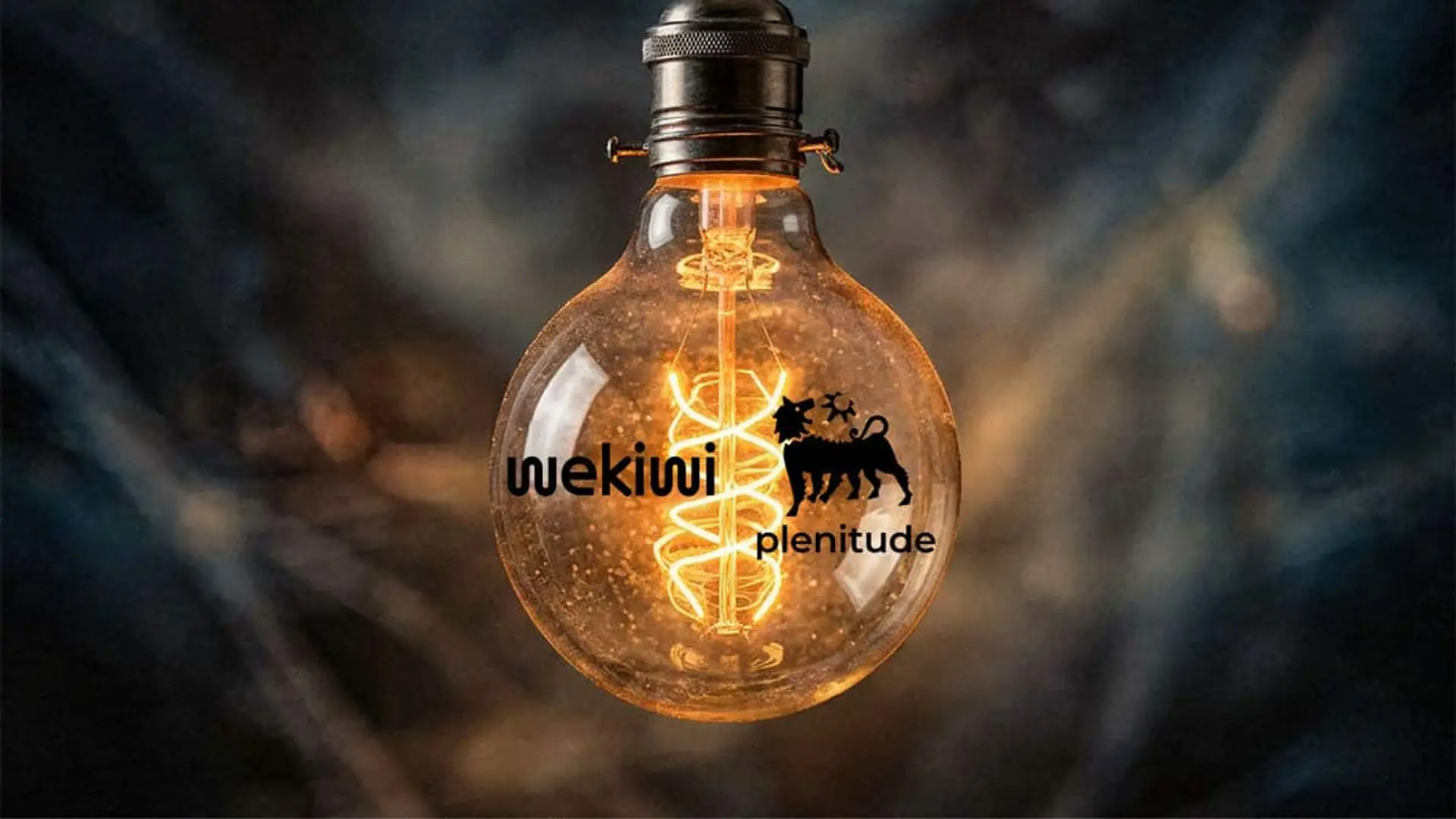 Bombilla encendida con los logotipos de Wekiwi y Plenitude sobre la imagen