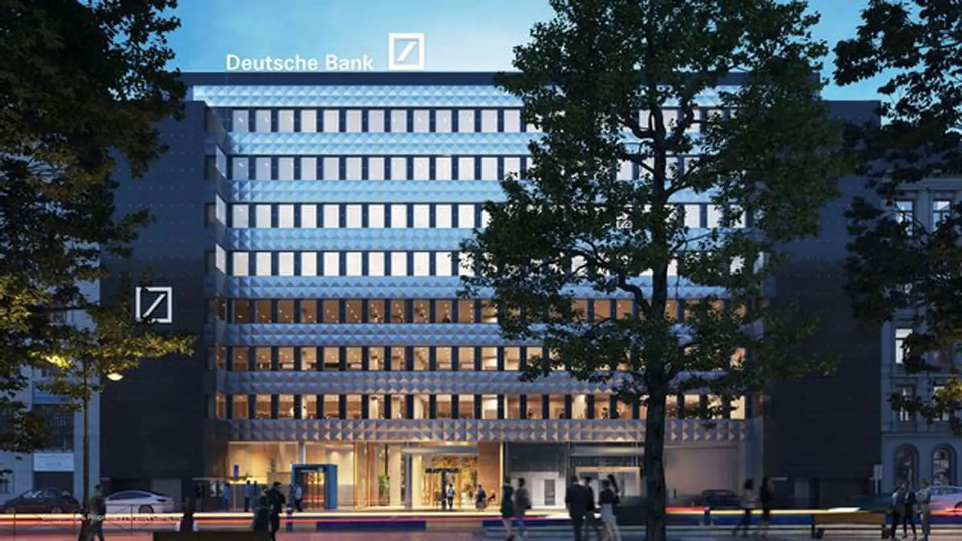 Sede corporativa de Deutsche Bank, con su fachada moderna iluminada por la noche en un entorno urbano.