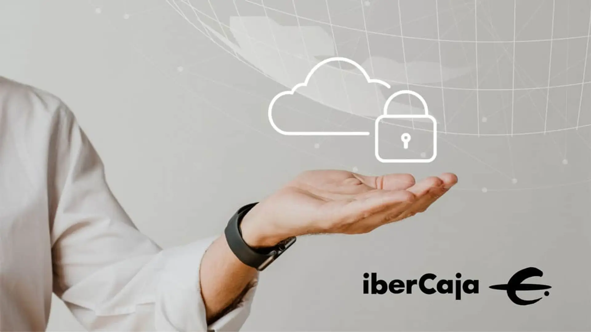 Ibercaja lanza un seguro de ciberataques para pymes que cubre la parada de negocio, el fraude y la extorsión Concepto de ciberseguridad en Ibercaja con iconos de nube y candado para la protección de datos digitales.