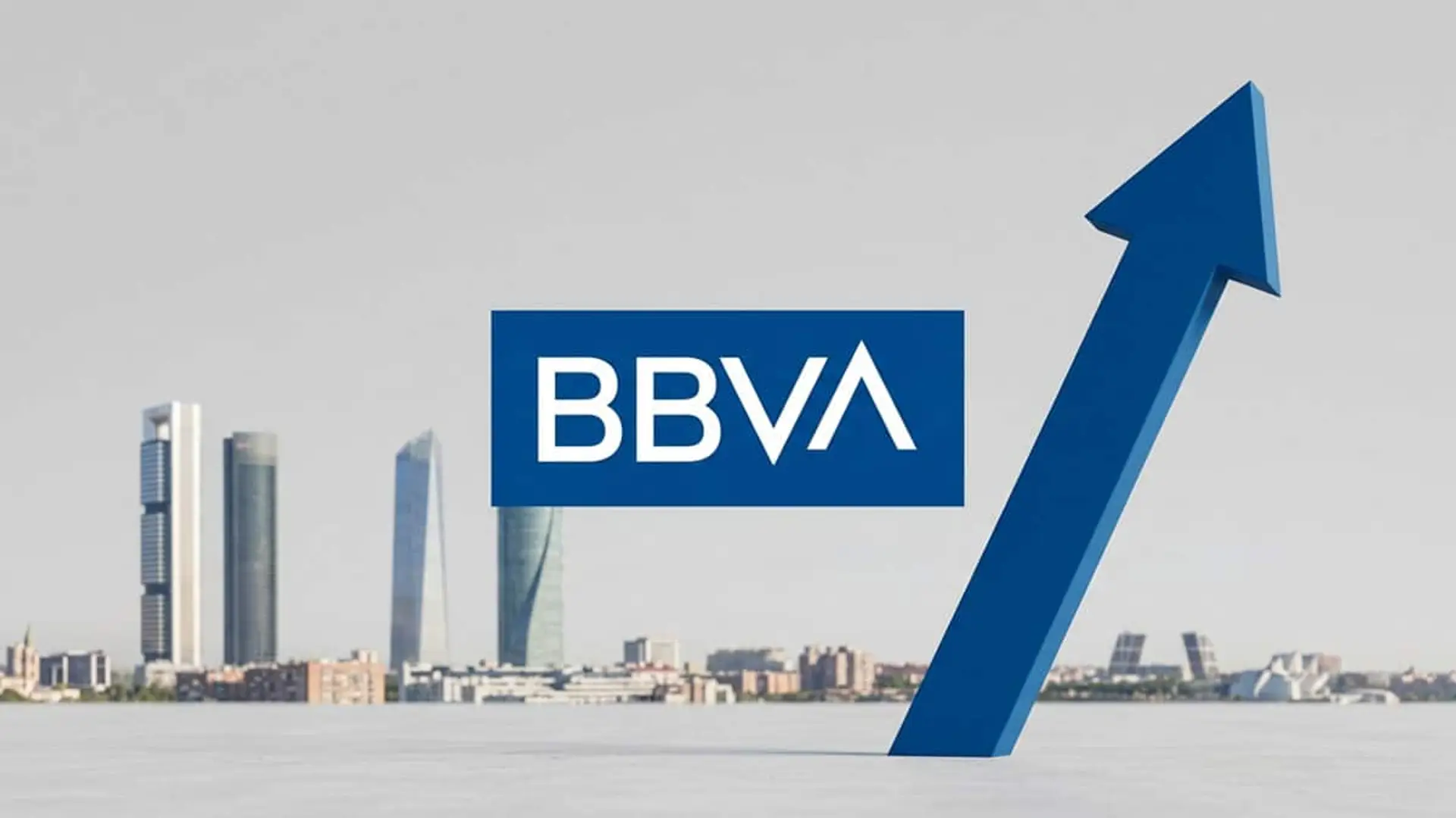 Logotipo de BBVA con una flecha ascendente azul y el skyline de Madrid desenfocado al fondo