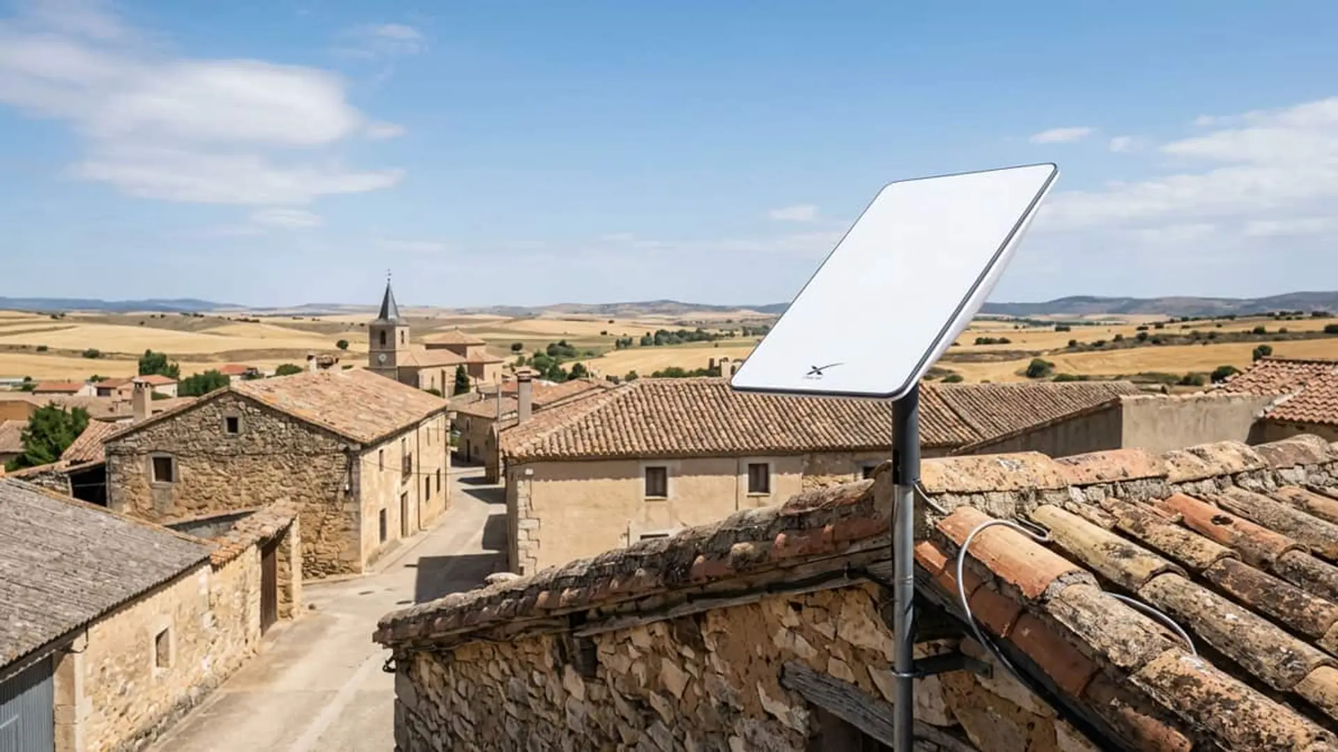 Antena de internet por satélite Starlink instalada en el tejado de una vivienda de un pueblo rural