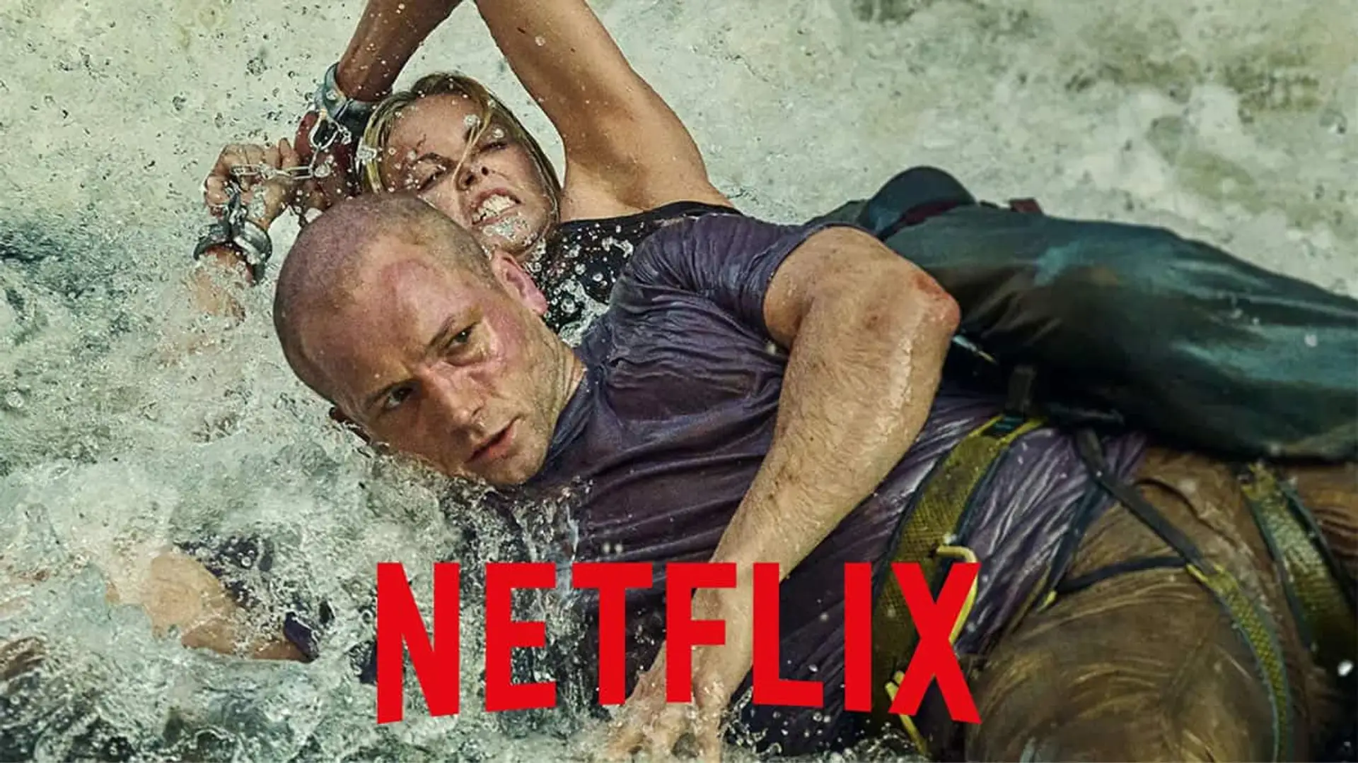 Charlize Theron y Taron Egerton en una escena de Apex en mitad de un río, con el logo de Netflix superpuesto.