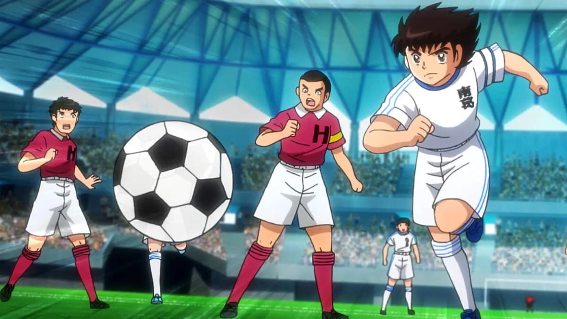 Oliver y Benji han vuelto a Netflix, pero ya no se llaman así: todo sobre el remake con doblaje en castellano Escena de Captain Tsubasa con varios jugadores en el campo y un balón en primer plano