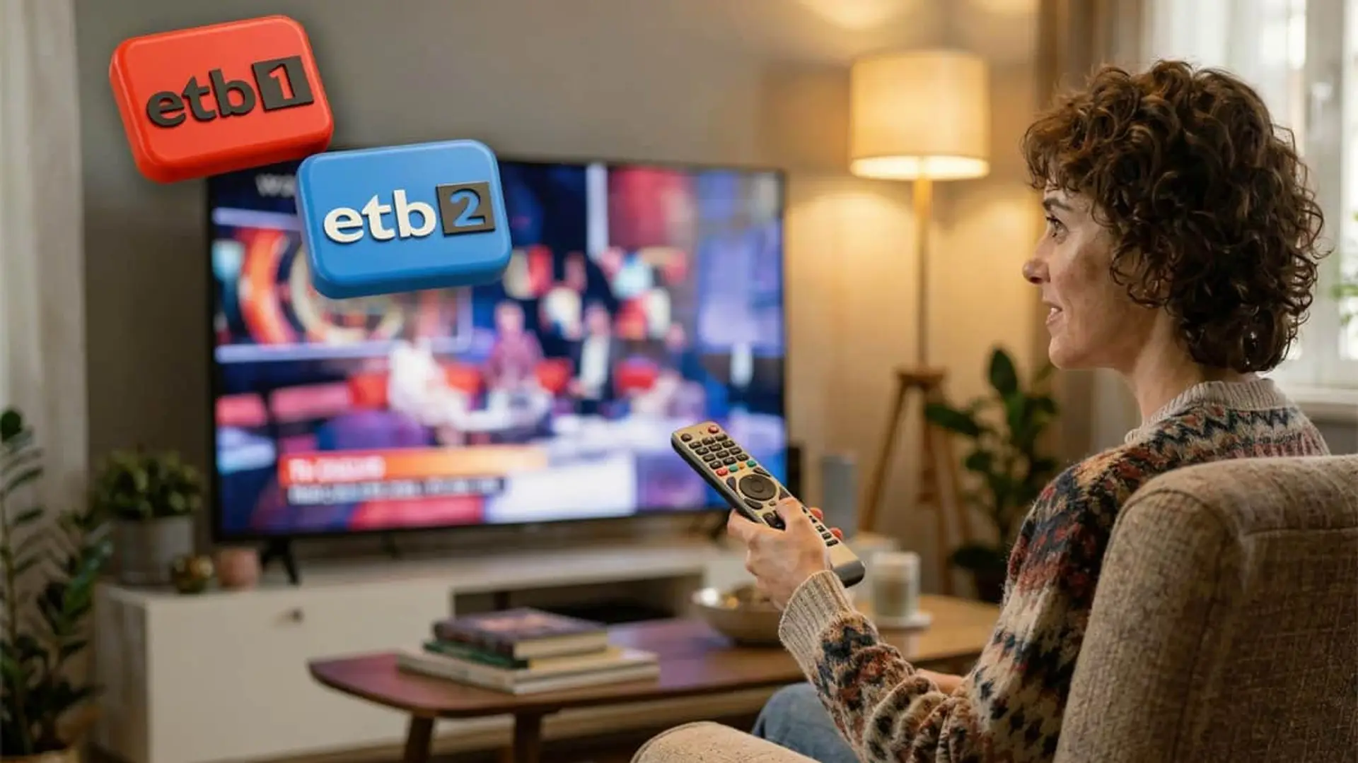 Mujer con mando viendo los canales ETB 1 y ETB 2 en su televisión para disfrutar de la programación vasca en casa