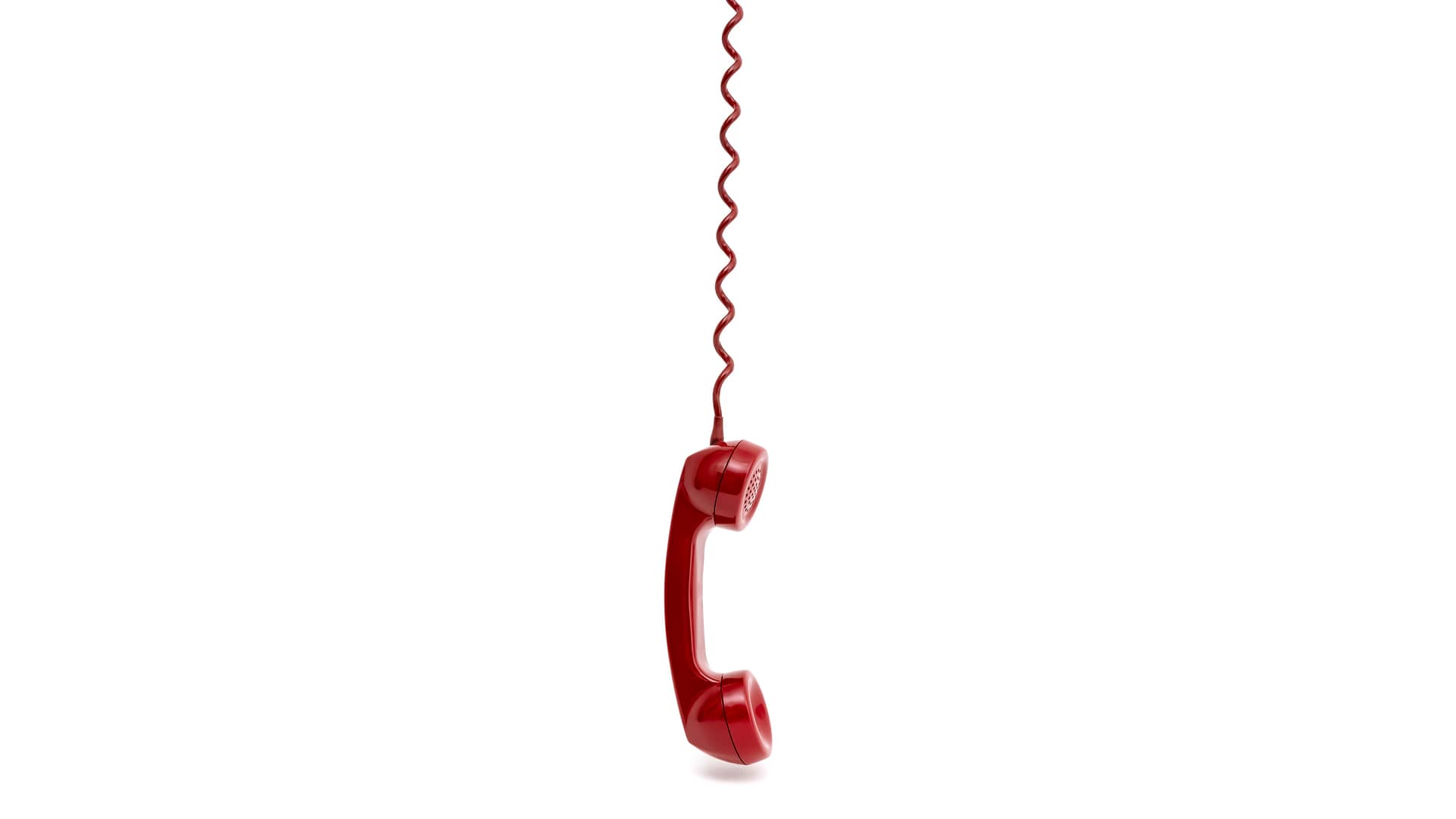 Teléfono fijo colgando de su cable simboliza tarifas descatalogadas de lowi