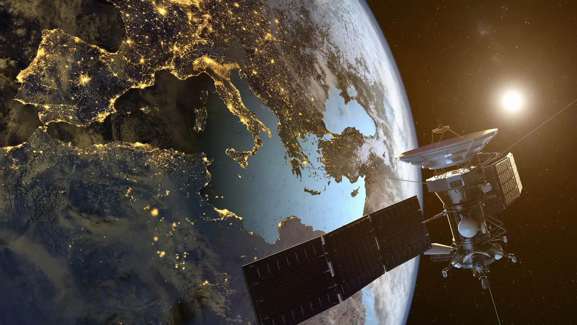 Satélite orbitando sobre la tierra simboliza fibra satélite de másmovil Satélite orbitando sobre la tierra simboliza fibra satélite de másmovil