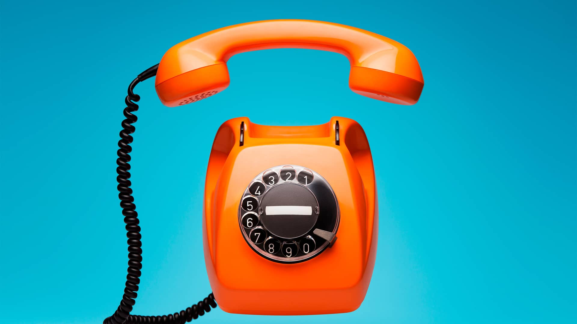 Antiguo teléfono naranja representa tarifas descatalogadas de orange